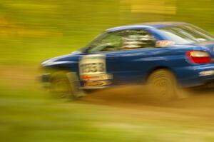 Eric Langbein / Jeremy Wimpey Subaru WRX at speed on Halverson Lake, SS1.