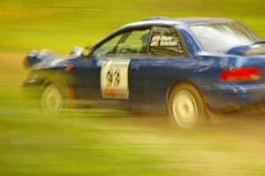 Bob Olson / Conrad Ketelson Subaru 2.5RS at speed on Halverson Lake, SS1.