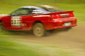 Micah Wiitala / Jason Takkunen Mitsubishi Eclipse GSX at speed down a straight on Halverson Lake, SS1.