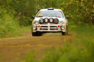 Bruce Davis / Jimmy Brandt Dodge SRT-4 comes over a crest near the finish of SS1, Halverson Lake.