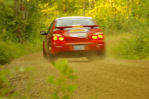 John Cirisan / Josh Hamacher Subaru WRX at speed through the final right-hand sweeper on Halverson Lake, SS1.