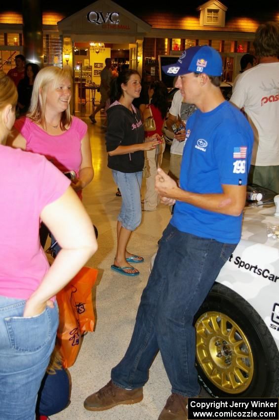 Travis Pastrana converses with his fans at the Mall of America.
