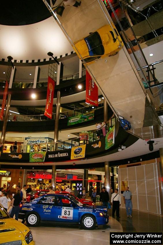 Mark Utecht / Rob Bohn Subaru WRX on display while other cars are mirrored above at the Mall of America.