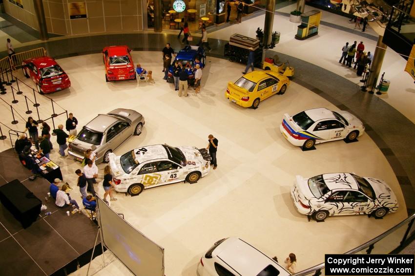 A view from the upper floor of the Mall of America of rally cars on display (3).