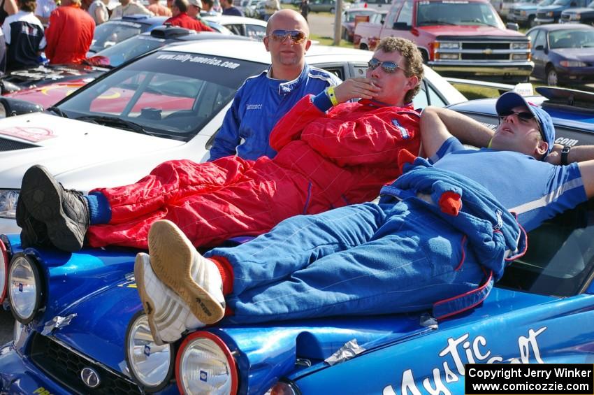 Mark McElduff and Damien Irwin relax on the hood of their Subaru WRX STi at parc expose on day one.