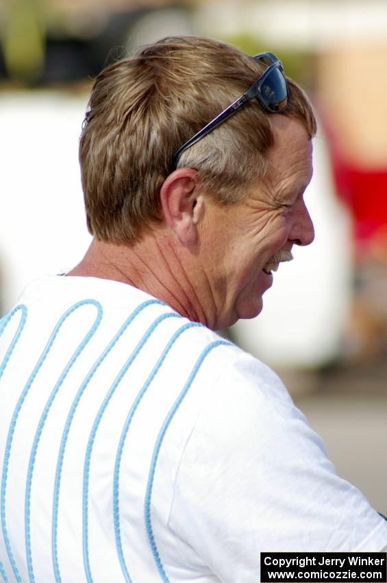 Bruce Davis cracks a big grin at parc expose on day one. Jimmy Brandt was his co-driver in his Dodge SRT-4.