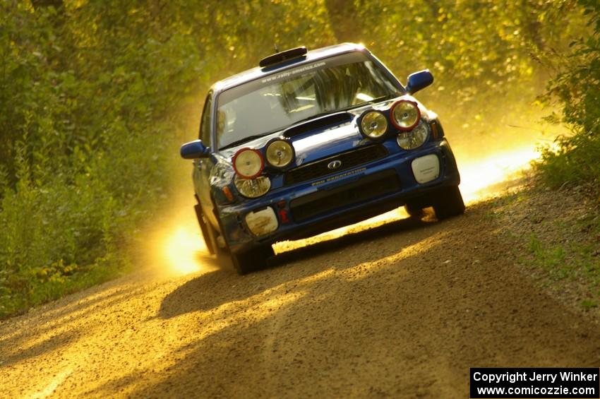 Mark McElduff / Damien Irwin Subaru WRX STi is seen here at speed on Halverson Lake, SS1.