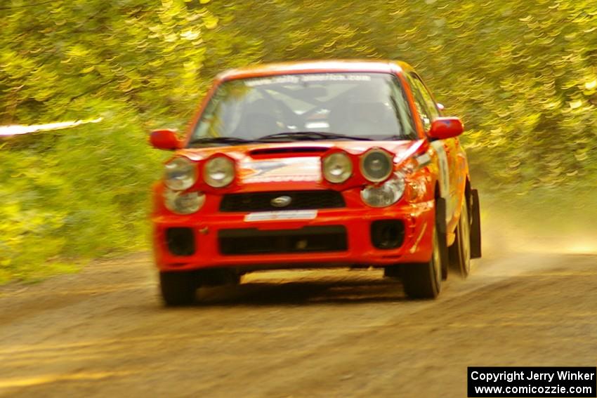 Matthew Johnson / Wendy Nakamoto Subaru WRX comes out of a fast left-hander on Halverson Lake, SS1.