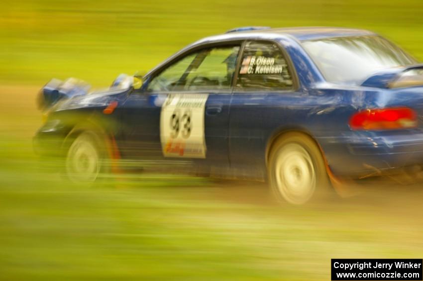 Bob Olson / Conrad Ketelson Subaru 2.5RS at speed on Halverson Lake, SS1.