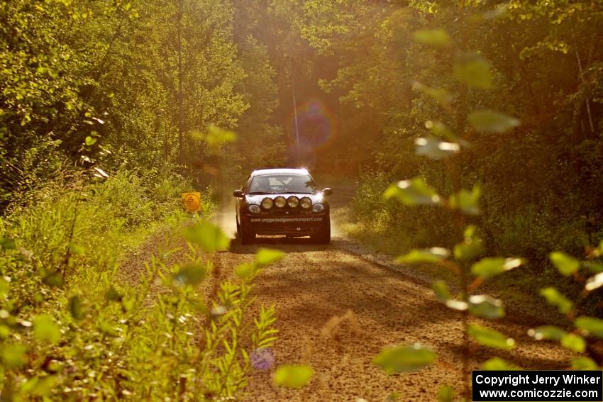 Sans Thompson / Craig Marr Dodge Neon ACR comes across the finish of Halverson Lake, SS1.