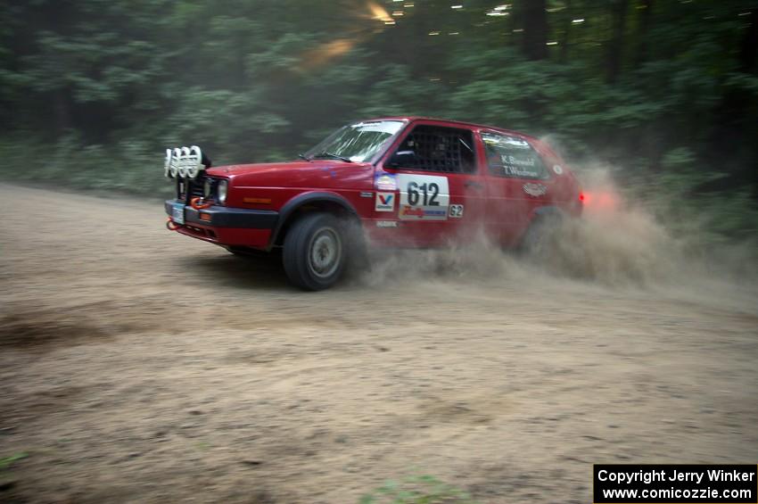 Karl Biewald / Ted Weidman VW GTI at a hairpin on SS1.