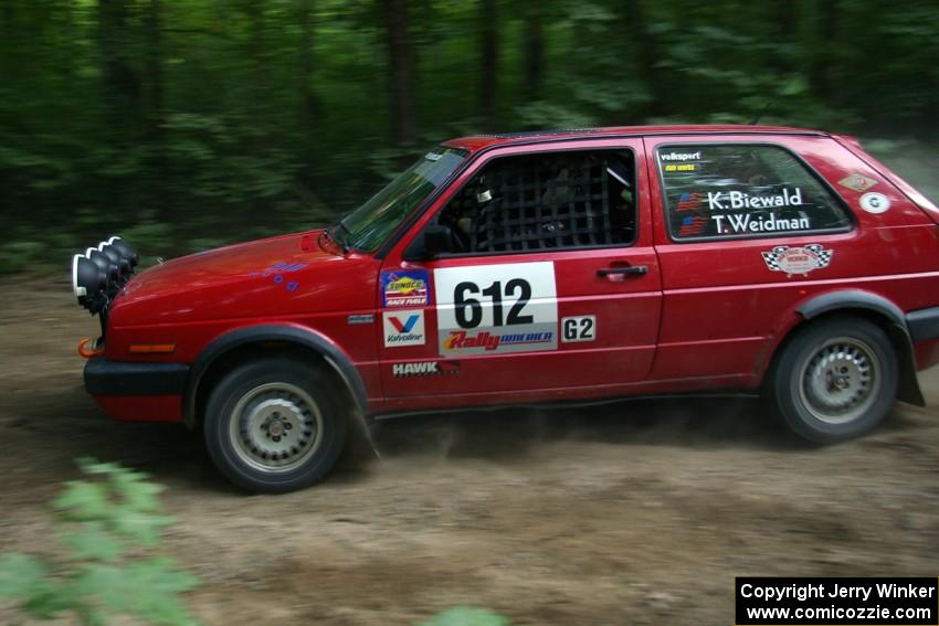 Karl Biewald / Ted Weidman VW GTI exits a hairpin on SS1.