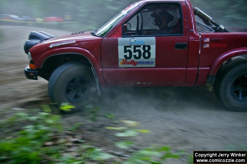 Jim Cox / Ryan LaMothe Chevy S-10 at a hairpin on SS1.