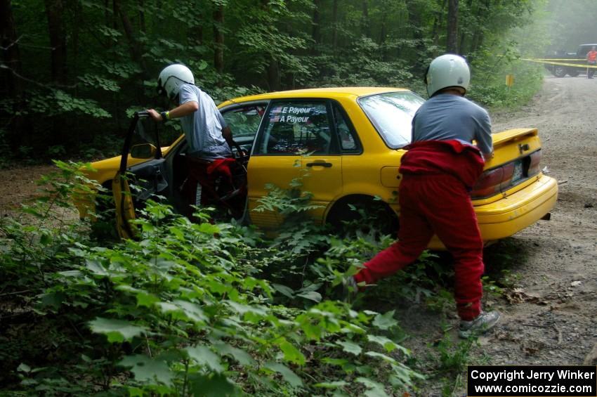 Erik Payeur / Adam Payeur Mitsubishi Galant got stuck atop a boulder at the apex of a corner on SS1 (2).