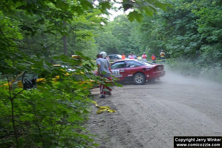 Erick Nelson / Greg Messler Ford Probe GT at the first sharp hairpin left on SS1.