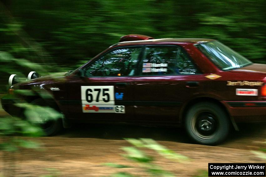 Ben Hanka / Greg Hanka Mazda Protege at speed on SS1.