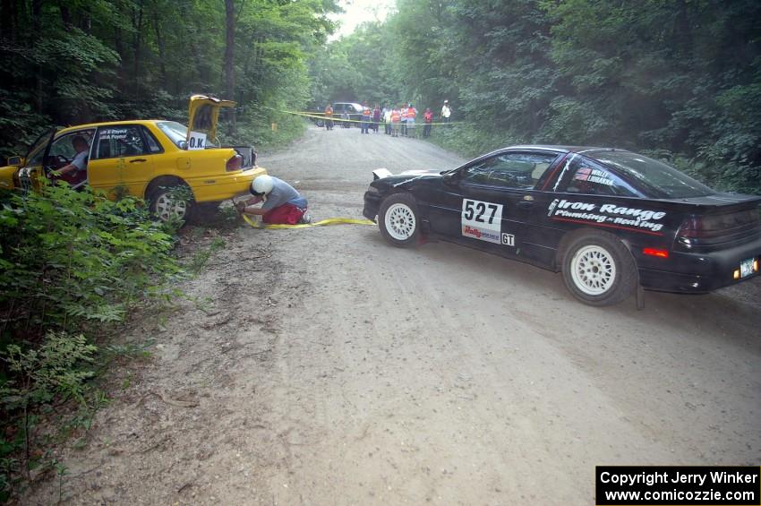 Craig Walli / Jonah Liubakka Eagle Talon frees the Erik Payeur / Adam Payeur Mitsubishi Galant off the boulder on SS1.