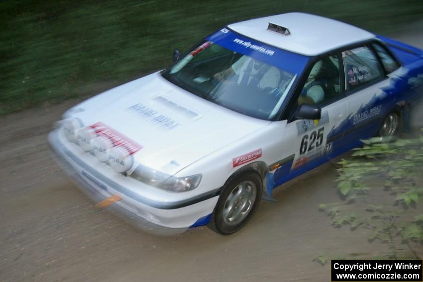 Mike Wray / John Nordlie Subaru Legacy Sport at speed on a straight on SS2.