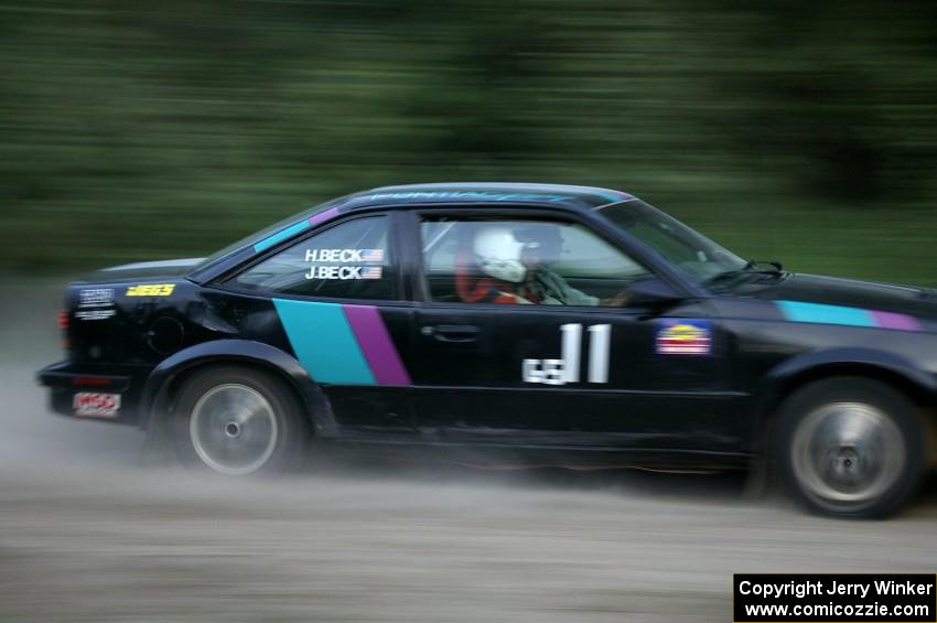 Jason Beck / Harry Beck Pontiac Sunbird at speed on SS2 before the car was totaled against a tree.