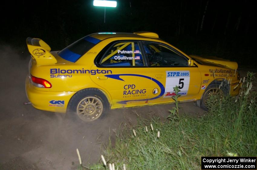 Lauchlin O'Sullivan / Scott Putnam Subaru Impreza drifts through a 90-right on SS4.