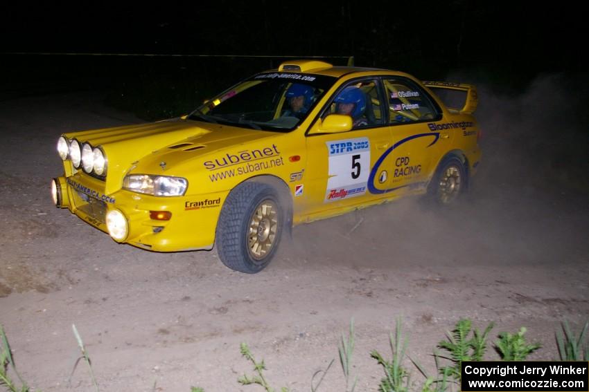 Lauchlin O'Sullivan / Scott Putnam Subaru Impreza on a 90-left on SS6 at 1AM.