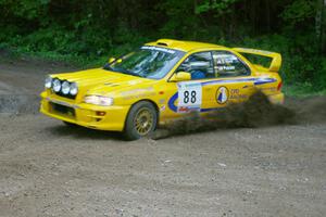 Doug Havir / Scott Putnam Subaru Impreza at speed through a 90-right on SS2, Spur 2.