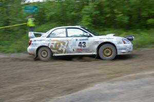 Ken Block / Alex Gelsomino Subaru WRX STi drifts wide at 90-right on SS2, Spur 2. They rolled and DNF'ed on the next stage.