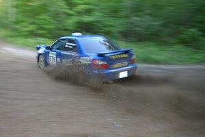 Mark McElduff / Damien Irwin Subaru WRX STi drifts through a 90-right on SS2, Spur 2.