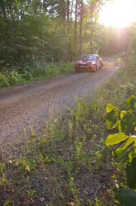 Matthew Johnson / Wendy Nakamoto Subaru WRX at speed on an uphill section of SS2, Spur 2.