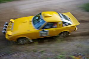 Jake Himes / Matt Himes Mazda RX-7 at speed through an uphill left-hand sweeper on SS2, Spur 2.