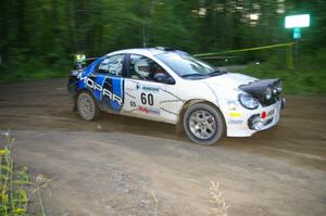 Bruce Davis / Jimmy Brandt Dodge SRT-4 at speed through a 90-right on SS2, Spur 2.