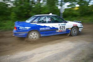 Mike Wray / Don DeRose Subaru Legacy Sport at speed through a 90-right on SS2, Spur 2.