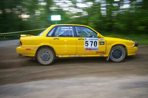 Erik Payeur / Adam Payeur Mitsubishi Galant drifts through a 90-right on SS2, Spur 2.