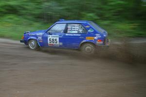 Dave Sterling / Stacy Sterling Dodge Omni GLH at speed through a 90-right on SS2, Spur 2.