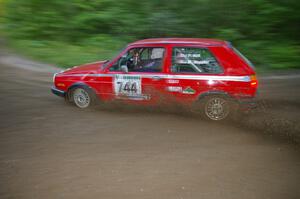 Paul Koll / Matt Wappler VW GTI throws gravel at a 90-right on SS2, Spur 2.