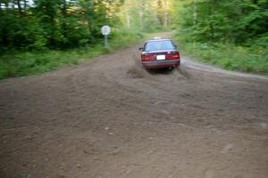 Ben Hanka / John Nordlie Mazda Protege drifts the back end through a 90-right on SS2, Spur 2.