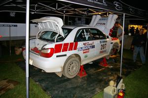 Dave Hintz / Rick Hintz Subaru WRX gets serviced in Akeley after the first set of stages on day one.