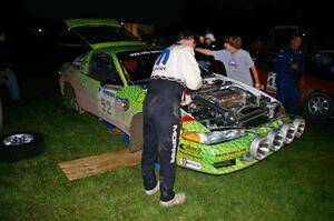 Doug Shepherd / Pete Gladysz Mitsubishi Eclipse gets serviced in Akeley after the first set of stages.