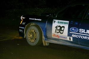 Travis Pastrana / Christian Edstrom Subaru WRX STi comes out of a 90-left on SS7, Blue Trail.