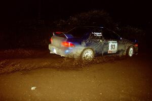 Bob Olson / Conrad Ketelson Subaru 2.5RS drifts through a 90-left on SS7, Blue Trail.