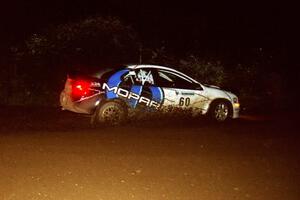 Bruce Davis / Jimmy Brandt Dodge SRT-4 drifts through a 90-left on SS7, Blue Trail.