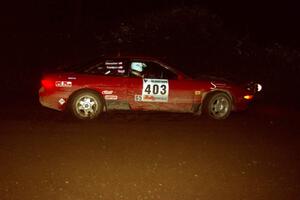 Erick Nelson / Greg Messler Ford Probe GT at speed through a 90-left on SS7, Blue Trail.