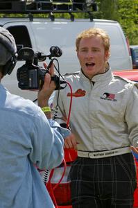 Matthew Johnson is interviewed prior to the start of the Bemidji Speedway stage.