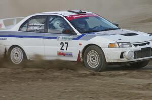 Chris Gilligan / Joe Petersen Mitsubishi Lancer Evo IV drifts through the infield at the Bemidji Speedway, SS8.