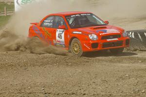 Matthew Johnson / Wendy Nakamoto Subaru WRX sprays gravel through the infield at the Bemidji Speedway, SS8.