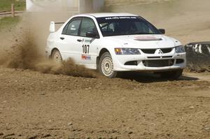 Tim Paterson / John Allen Mitsubishi Lancer Evo VIII sprays gravel through the infield at the Bemidji Speedway, SS8.