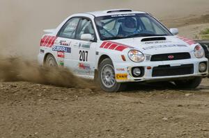 Dave Hintz / Rick Hintz Subaru WRX at speed through the infield at the Bemidji Speedway, SS8.