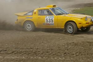 Jake Himes / Matt Himes Mazda RX-7 slings gravel through the infield at the Bemidji Speedway, SS8.