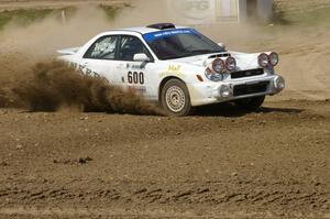 Fintan McCarthy / Noel Gallagher Subaru WRX STi slings gravel through the infield at the Bemidji Speedway, SS8.