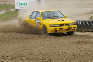 Erik Payeur / Adam Payeur Mitsubishi Galant sprays gravel through the infield at the Bemidji Speedway, SS8.